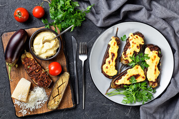 Papoutsakia stuffed eggplants, top view, flat lay