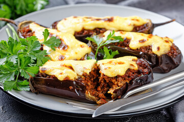 Eggplants stuffed with ground beef on a plate