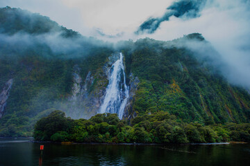 water falls in milford sound fiordland national park southland new zealand - 377635723