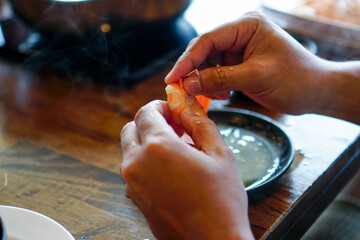 Fresh raw shrimps set with vegatables on the bamboo basket ready for cooking