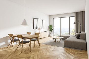 White living room corner with sofa and table