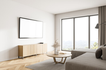 Fototapeta premium White living room corner with sofa and TV