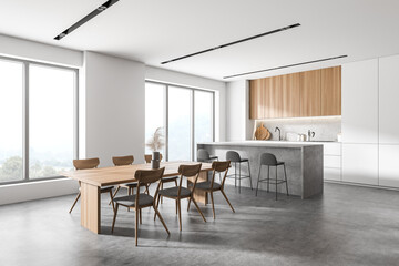 White and wooden kitchen corner with table