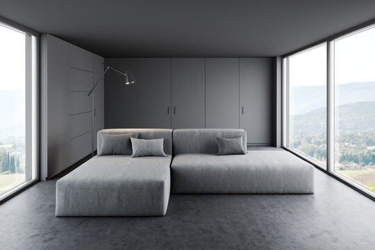 Gray living room with sofa and wardrobe