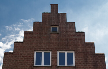 Obraz premium brick house in germany with a stepped roof