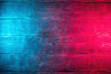 Wooden table surface in neon lights abstract background.