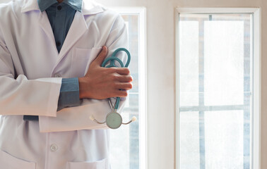 Doctor with a stethoscope in the hospital office.