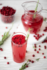 lingonberry juice with honey in glass