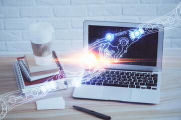 Double exposure of desktop computer and technology theme hologram. Concept of software development.