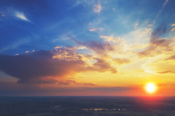 Colorful cloudy sky at sunset. Sunset over the countryside. Sky texture. Abstract nature background