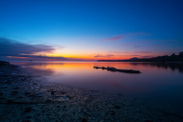 Colorful twilight in evening over seascape at Ao Wok Tum, Koh Phangan, Thailand. Long exposure photography.