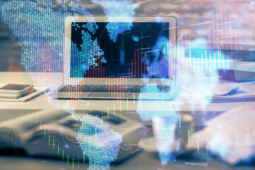 Double exposure of forex chart and work space with computer. Concept of international online trading.