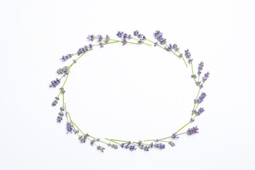 Frame with lavender flowers on white background, flat lay. Space for text