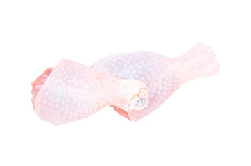 Set of two fresh chicken drumsticks isolated on a white background.