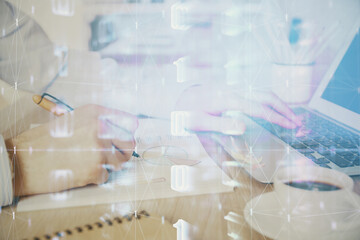 Businessman working on Laptop with technology theme drawing. Concept of big data. Double exposure.