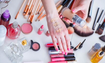 The collection of make up products displayed on the table