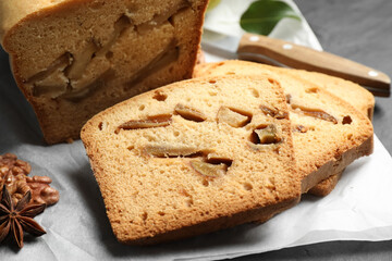 Slices of tasty pear bread on table, closeup. Homemade cake