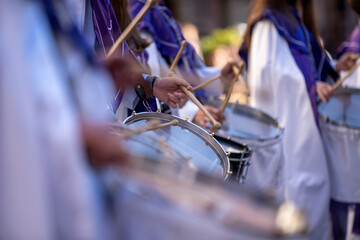 close-up of hands playing the drum during easter