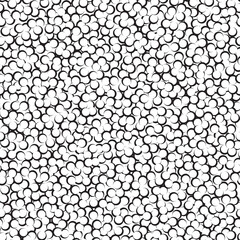 Seamless pattern of repeating black and white circles.