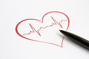 Stylized cardiogram and a pen