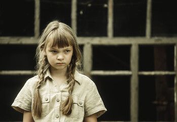 beautiful and sad teenage girl in rural style