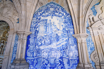 Azulejo mural in Porto Cathedral, a Catholic church in Porto, Portugal © momo11353