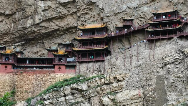 Xuankong or Hanging Temple on cliff at Mount Heng in Hunyuan, Datong, Shanxi, China. Over 1500 years old, mixing Buddhism, Taoism & Confucianism. Heritage & attraction.