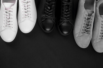 Two pair black and white of sneakers shoes