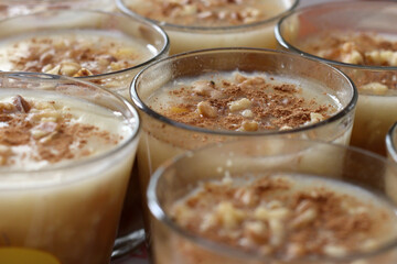Traditional Turkish dessert Asure with walnuts. (Noah's Pudding). Close up.