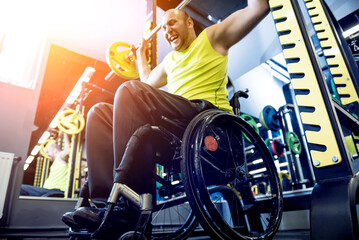 Disabled man training in the gym of rehabilitation center