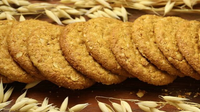Row of fresh baked oat cookies close up