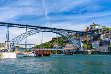 Fototapeta na wymiar Dom Luis I Bridge, a double-deck bridge across the River Douro in Porto, Portugal