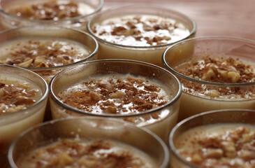 Traditional Turkish dessert Asure with walnuts. (Noah's Pudding). Close up.