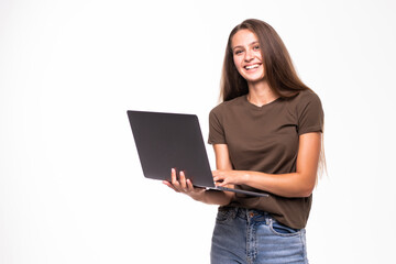 Portrait of a happy woman using laptop computer isolated on a white background