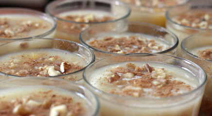 Traditional Turkish dessert Asure with walnuts. (Noah's Pudding). Close up.