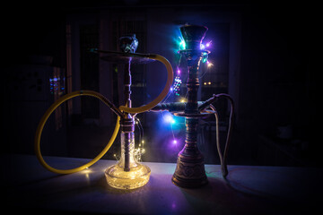 Hookah hot coals on shisha bowl with black background. Stylish oriental shisha. Shisha Concept