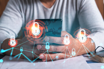 Man using phone. Hands typing smartphone. Double exposure with lock icon hologram. Close up. Datum cyber safety concept. Protection from hacker attack.