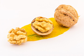 ripe walnuts on white background