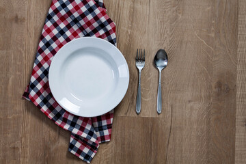 plate on wooden table