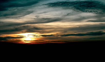 Fototapeta na wymiar Beautiful of sunset sky with warm contrast