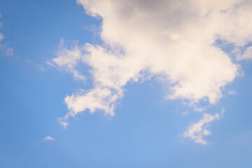 Obraz premium Blue sky with floating white clouds. The background.