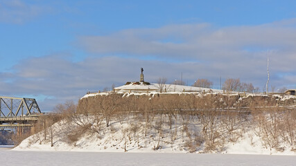 Fototapeta premium Nepean point, lookout hill along Ottawa river, covered in snow on a cold winter day. Ottawa, Canada 