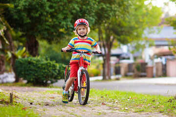 Kids on bike. Child on bicycle. Kid cycling.