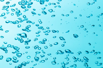 Air bubble and water splash,Water splash isolated on blue background.