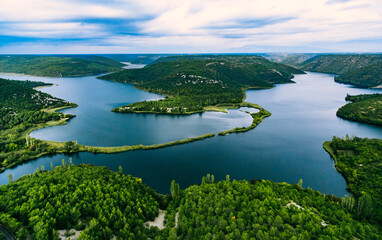 Fototapeta na wymiar Aerial view of blue lakes and green forest. Krka river national park, Croatia