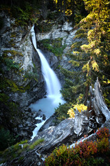 The Rutor waterfall, in Valle d'Aosta, descends impetuously among the rocks