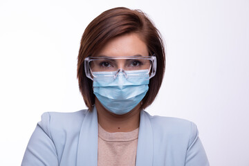 Doctor scientist or nurse portrait with facemask and protective glasses