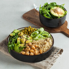 Healthy vegetable lunch from the Buddha bowl with quinoa, avocado, chickpeas. healthy food dish for vegetarians.
