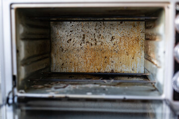 dirty oven, electric oven in fat