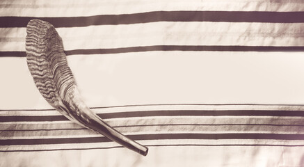 Top view of shofar (horn) on talit for prayer with talit.Prayer Shawl - Tallit and Shofar (horn)...